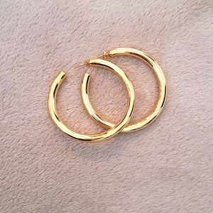 Large hoop gold earrings